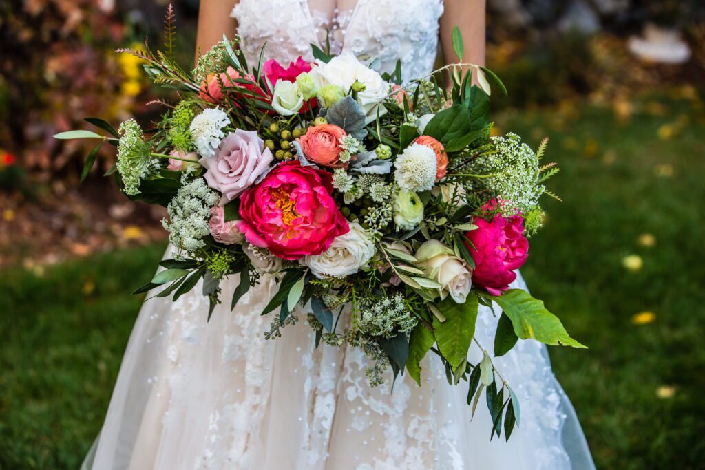 Pink, peach and white bridal bouquet with lush greenery