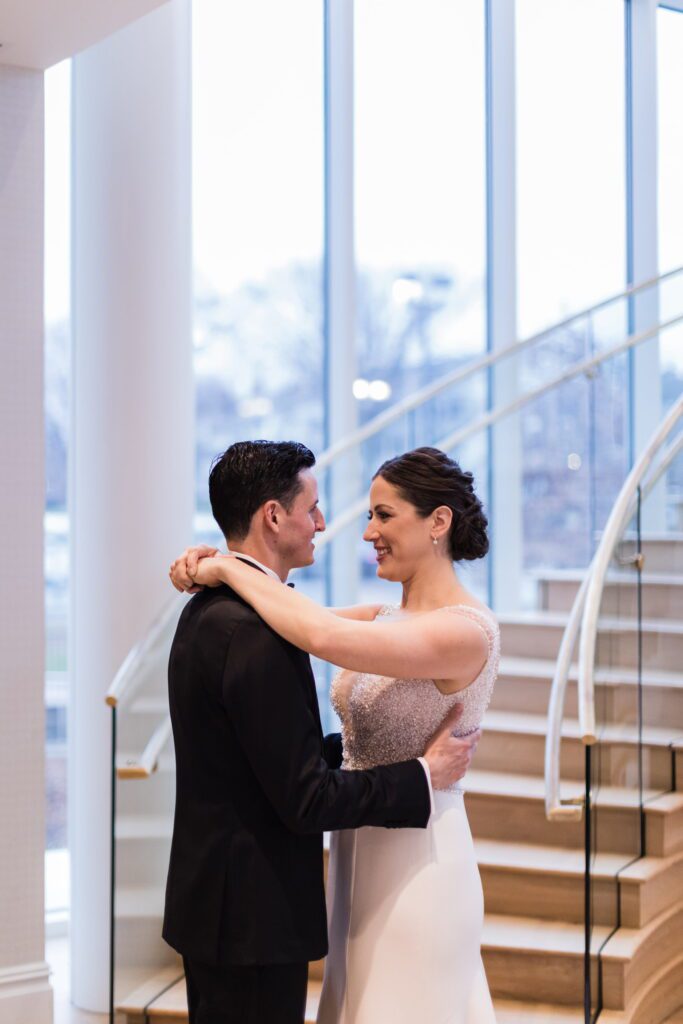 Nicole and Alex embracing after their first look