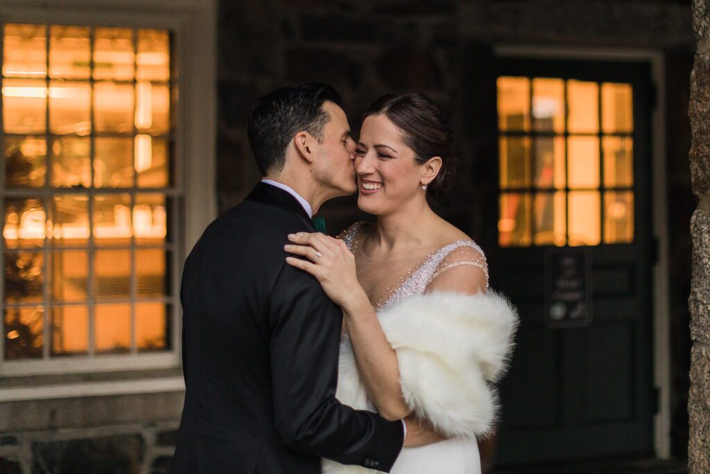 Alex kissing Nicole outside Hanover Inn in Hanover, New Hampshire