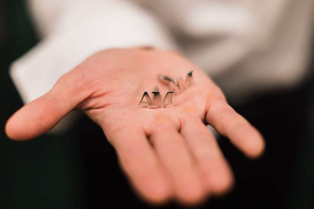 Personalized cufflinks with Nicole and Alex’s initials