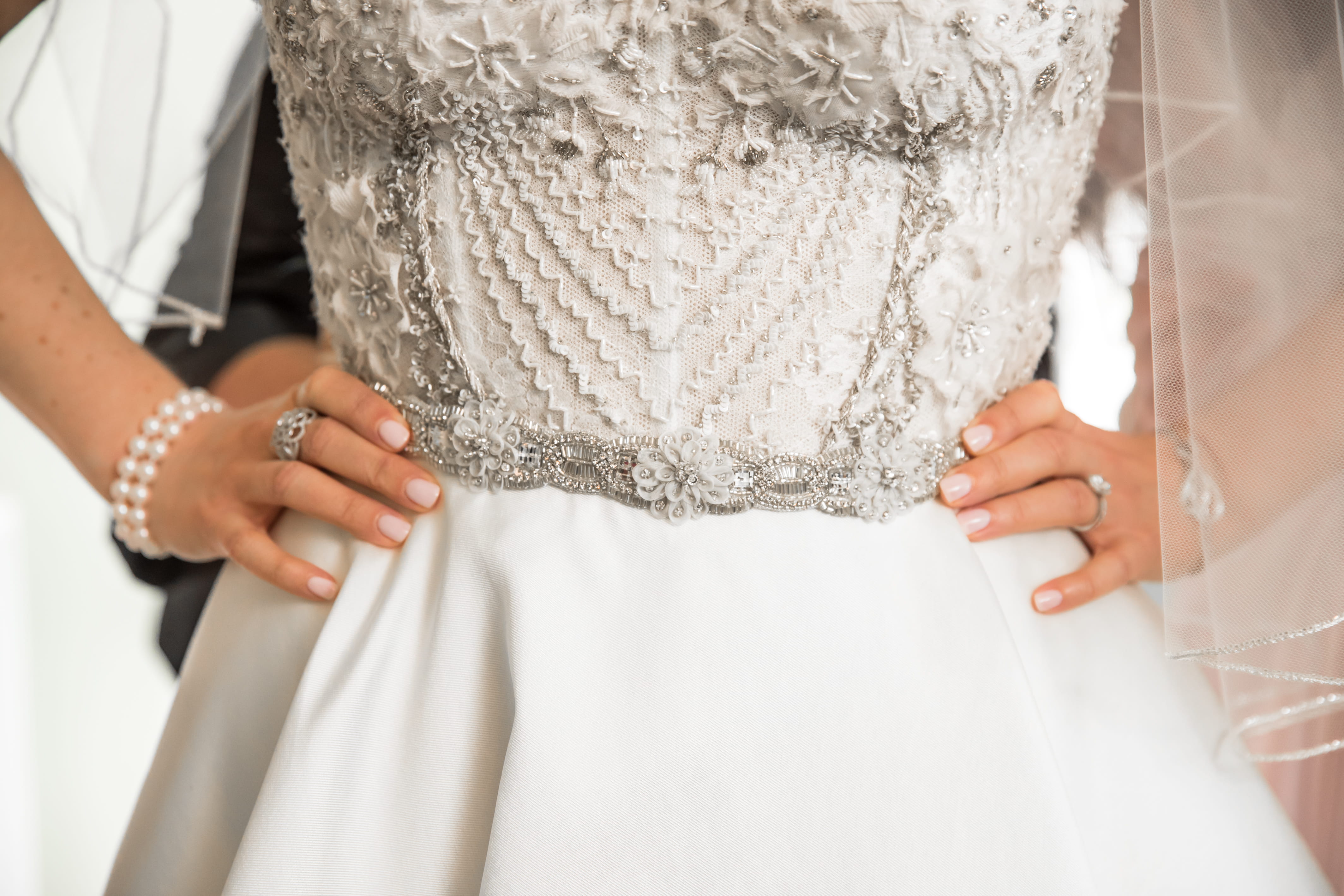 Beaded bodice and jeweled belt on Francesca’s wedding dress