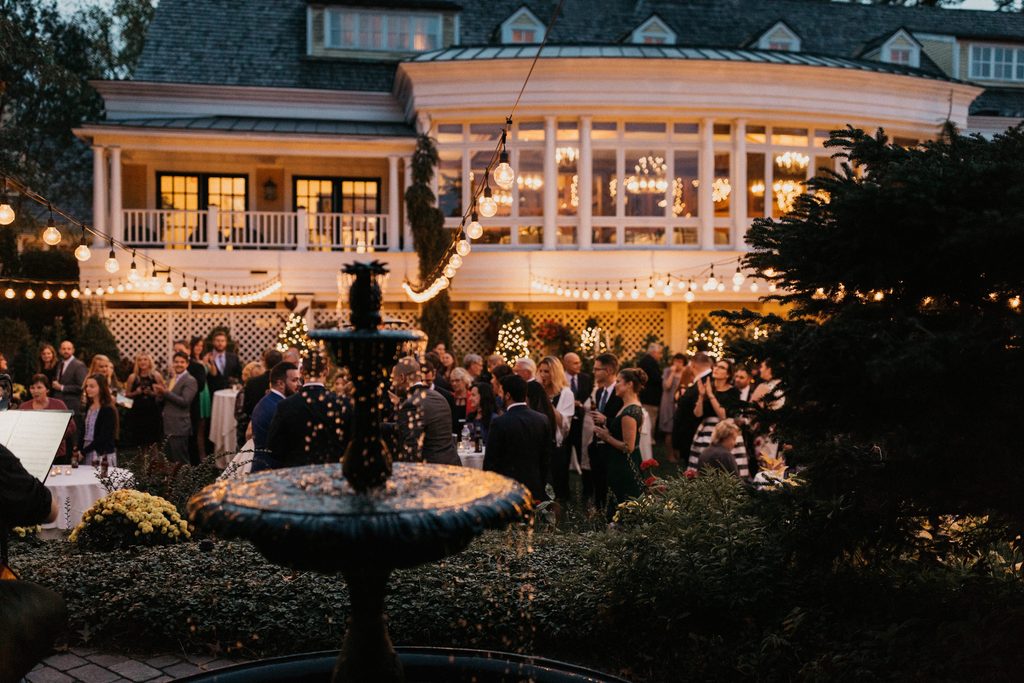 Evening cocktail hour beside the fountain at Bedford Village Inn
