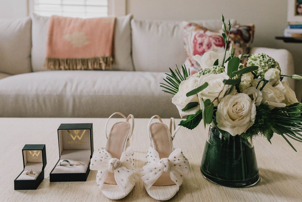 Bridal shoes, wedding rings and white bouquet for a Boston Yacht Club wedding