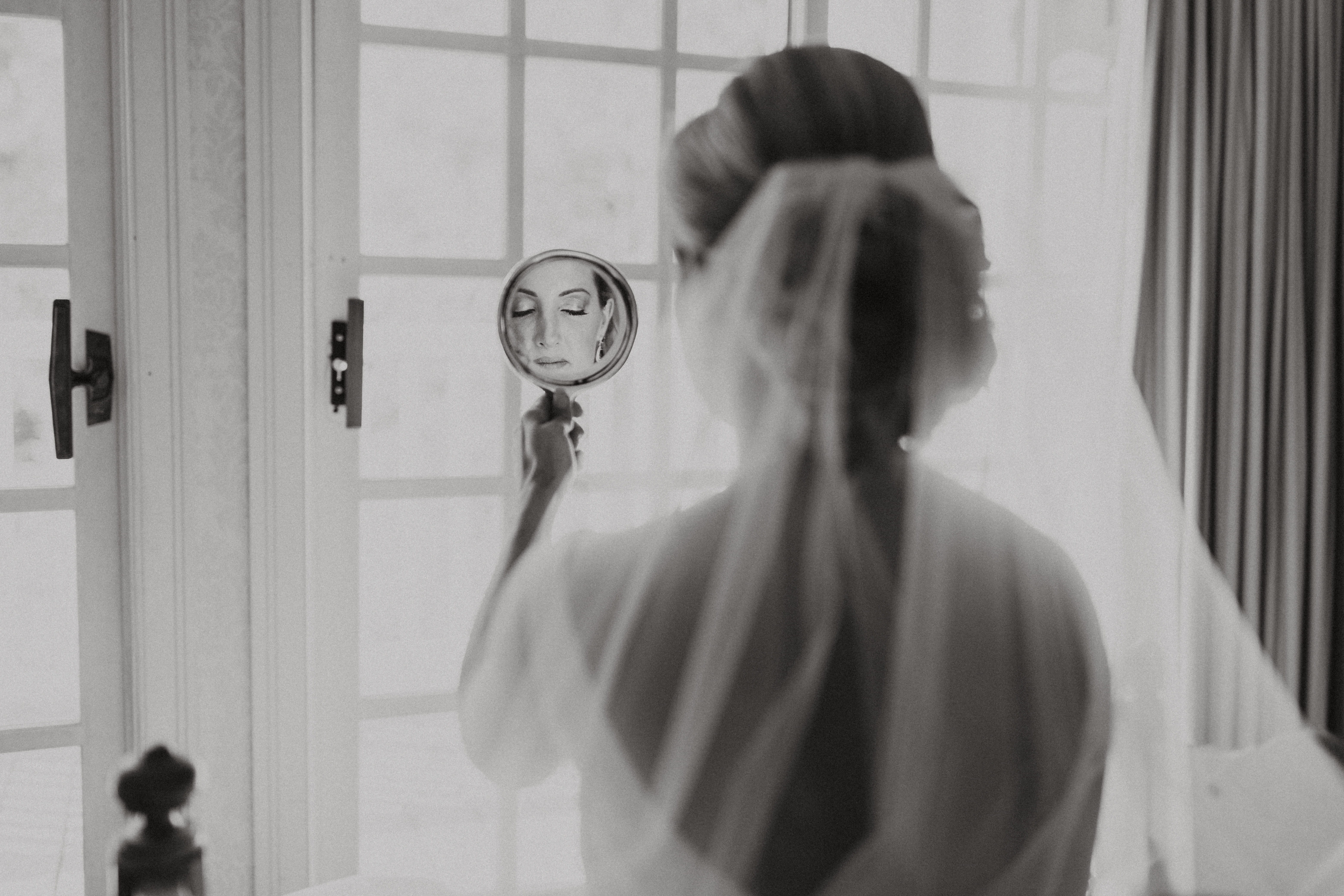 Kerry checking her veil before her October church wedding