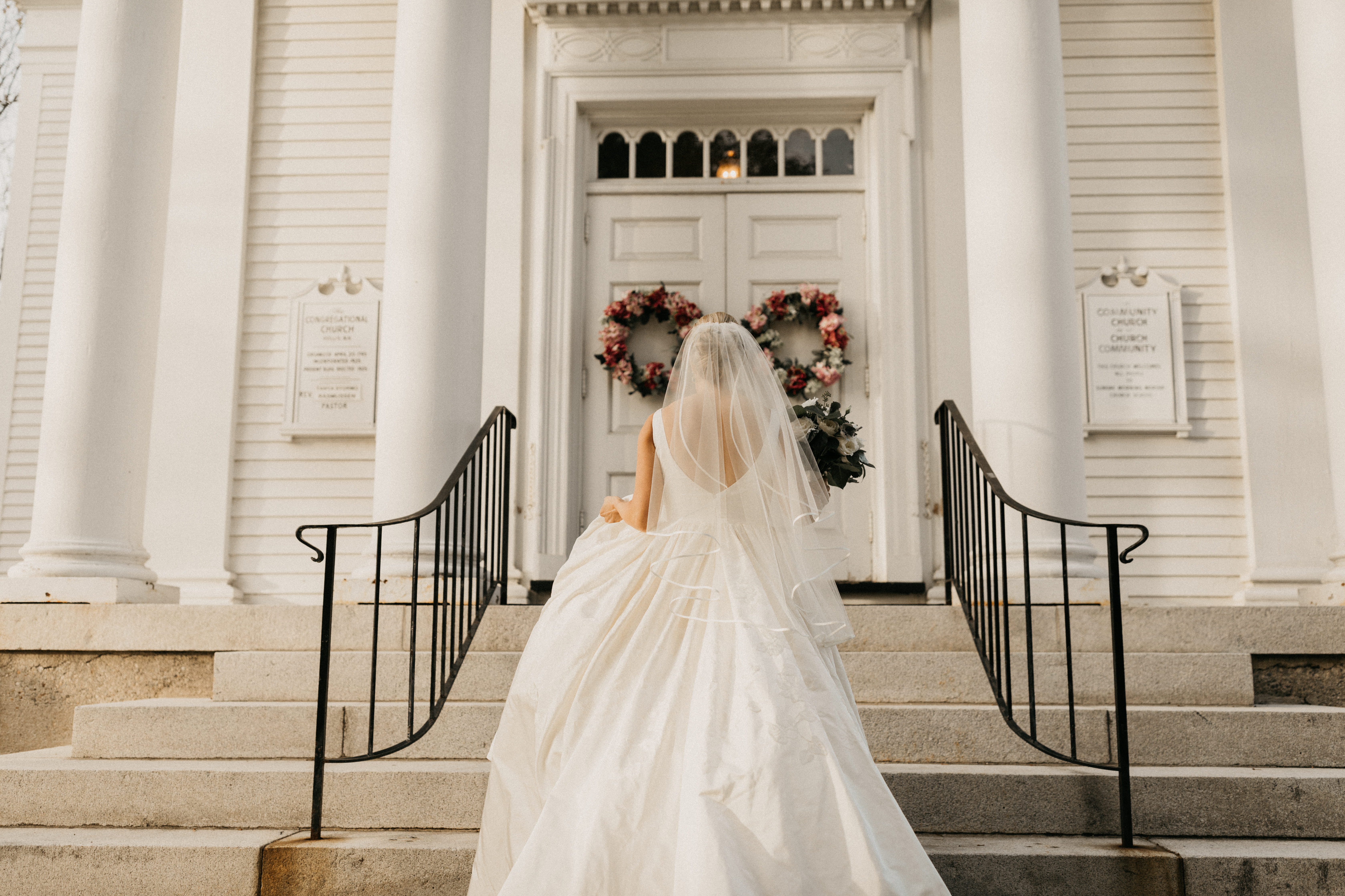 Kerry walking into Hollis Congregational Church for her wedding ceremony
