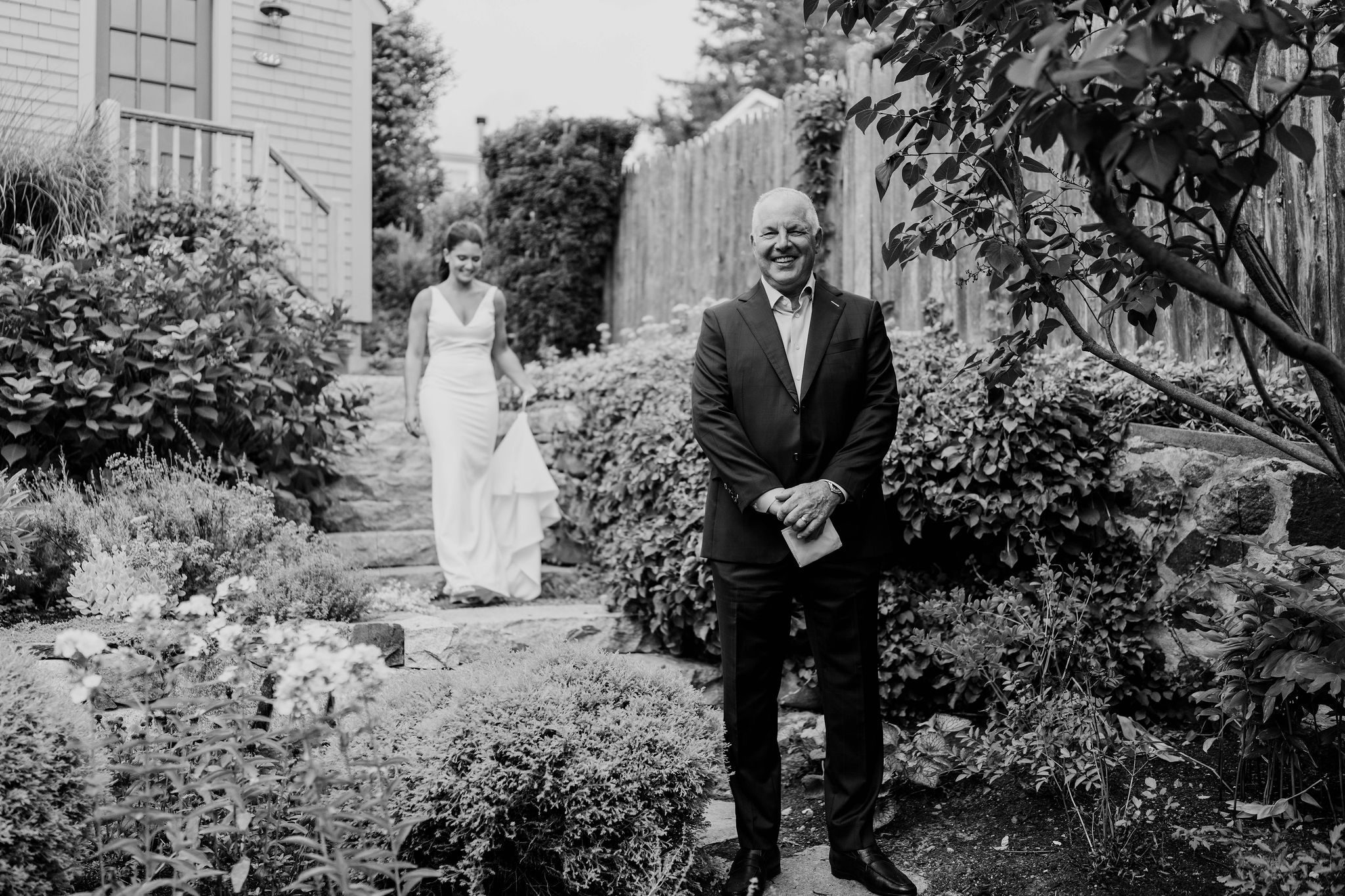 Erin approaching her father for their first look before the wedding