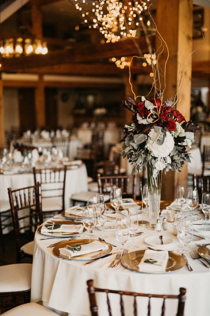 Deep-red and white wedding centerpiece at Bedford Village Inn