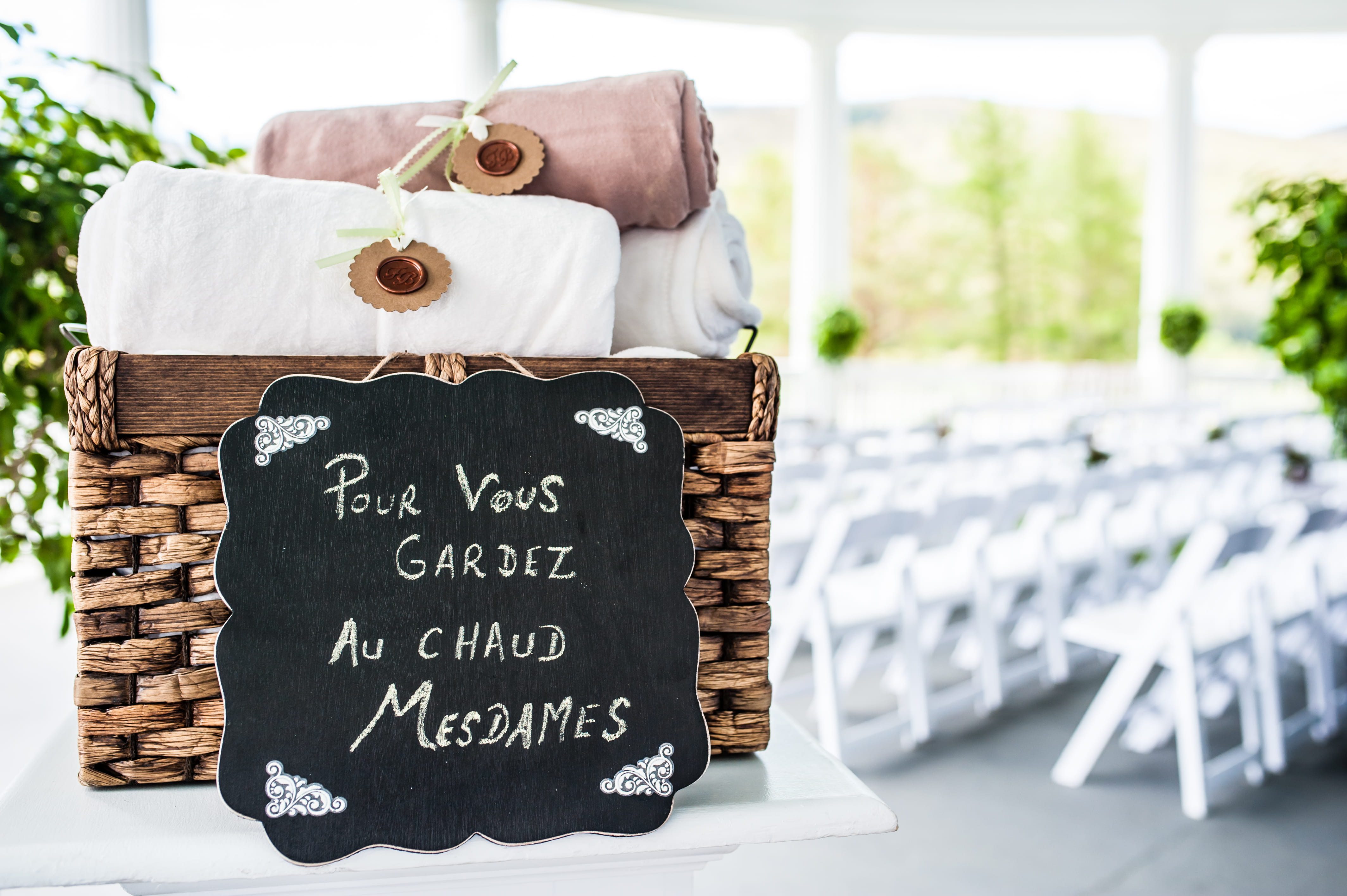 Blankets offered to guests at a French wedding ceremony in the White Mountains