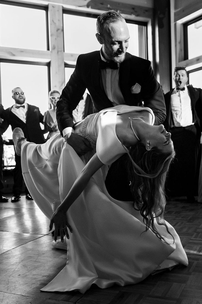 Alex dipping Katie during their first dance inside Crystal Hills