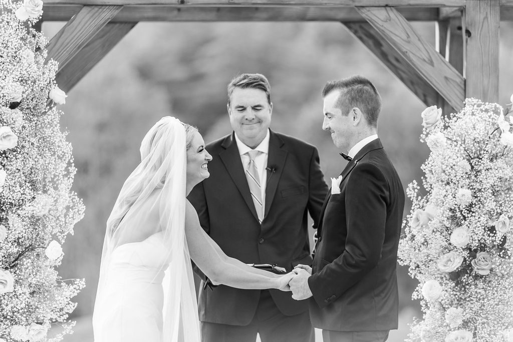 Morgan and Chris exchanging vows at Owl’s Nest Resort in Thornton, New Hampshire