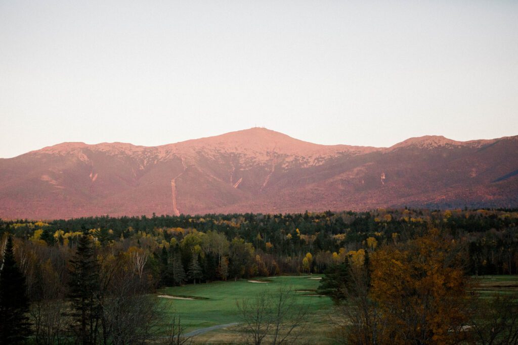 Sunset over Mount Washington and the surrounding fall foliage