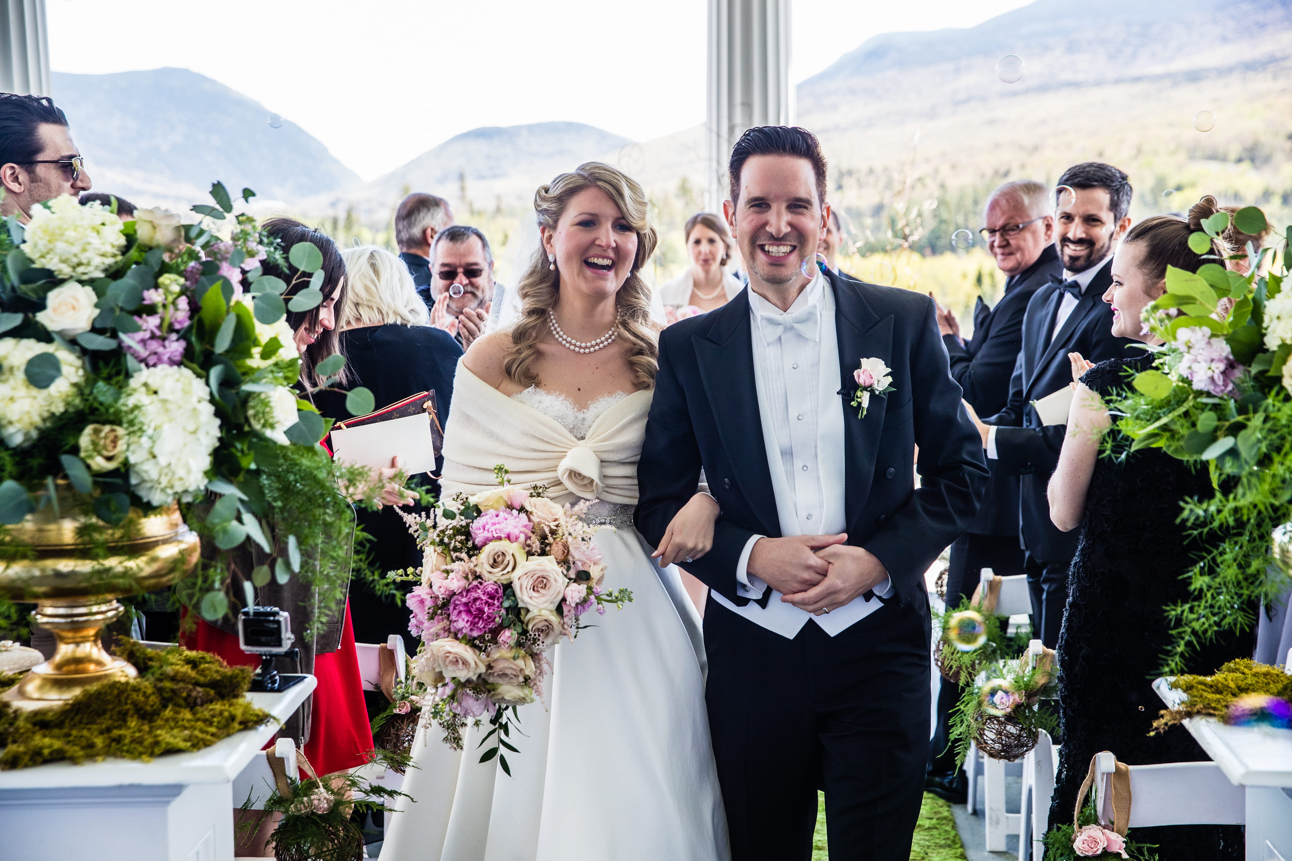 Francesca and Bernard walking down the aisle after their French wedding ceremony