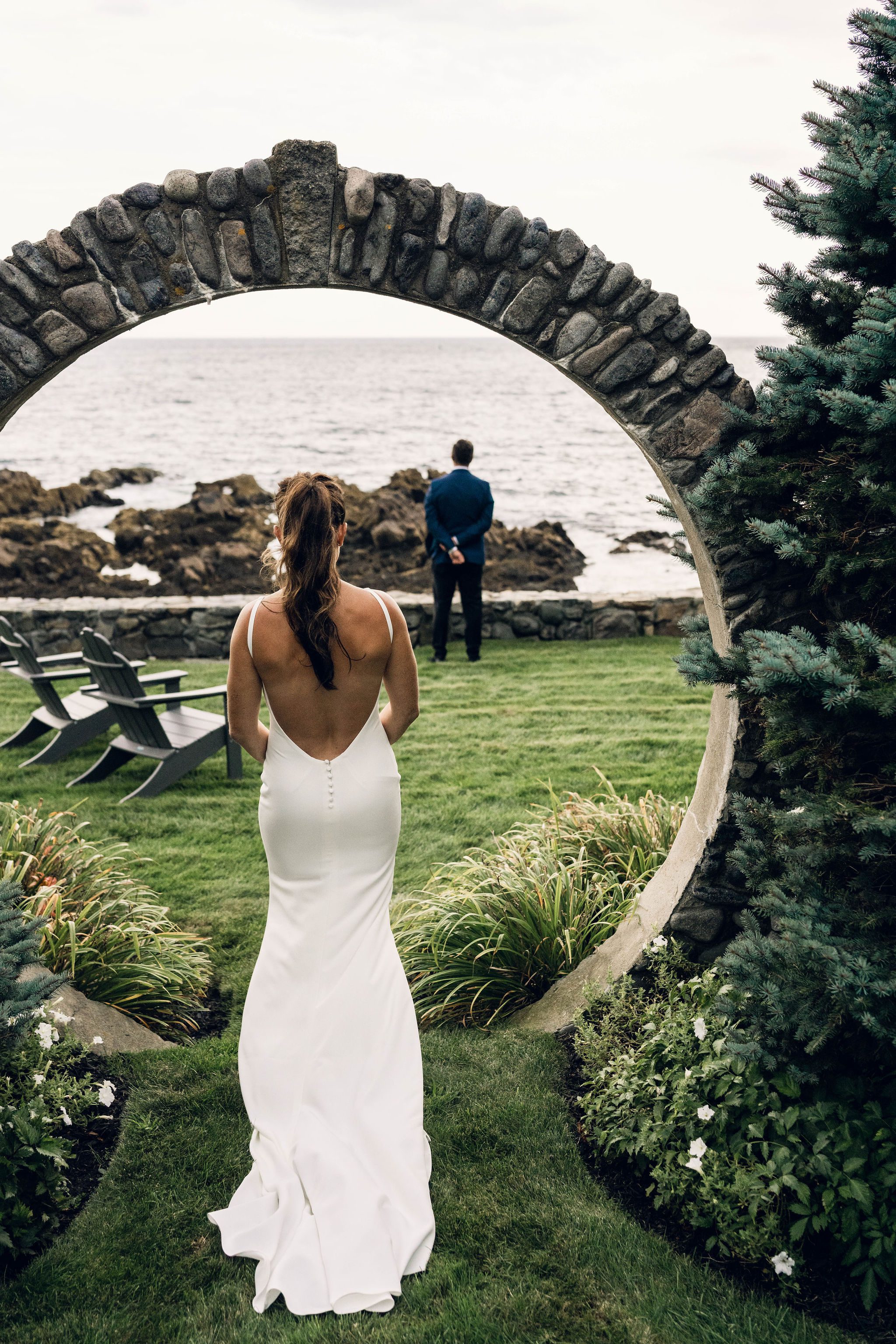 Erin approaching Rob for their oceanfront first look in Marblehead
