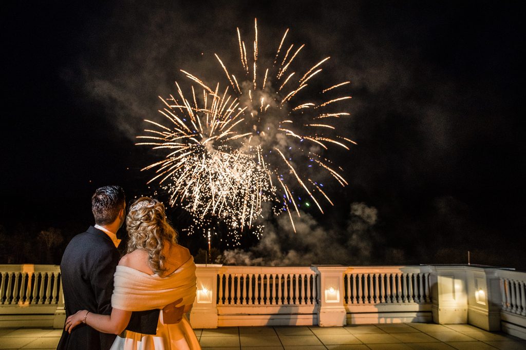 Francesca and Bernard watching wedding fireworks at the Omni Mount Washington Resort