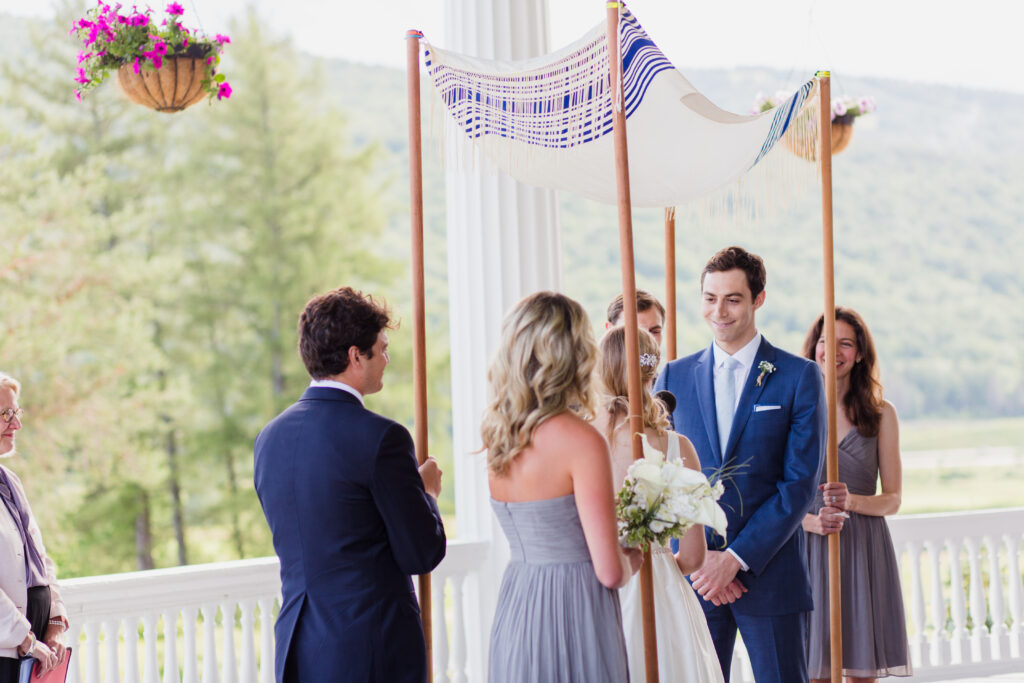 Personalized wedding chuppah overlooking the mountains at Omni Mount Washington Resort in Bretton Woods, New Hampshire