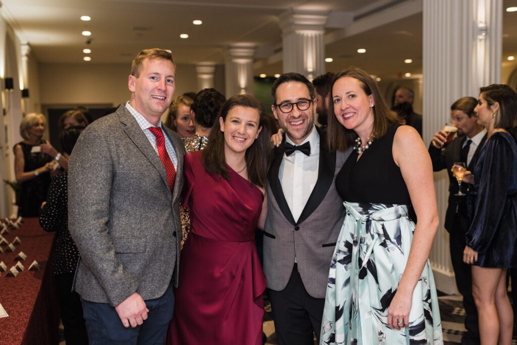 Guests wearing cocktail attire at a winter New England wedding